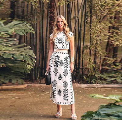 Charitini - Elegantes ärmelloses Oberteil Und Fließender Rock Im Satz