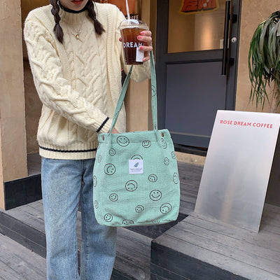 Jimena | Smiley-Tasche aus weichem Kordstoff