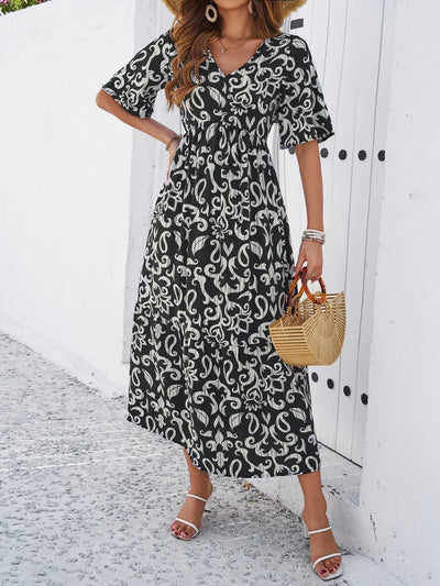Heidi-Mode | Elegante Maxi Kleid Mit V-Ausschnitt Und Druck