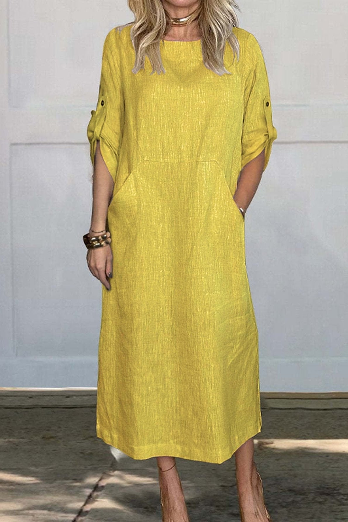 MAXIME ETUIKLEID MIT TASCHEN