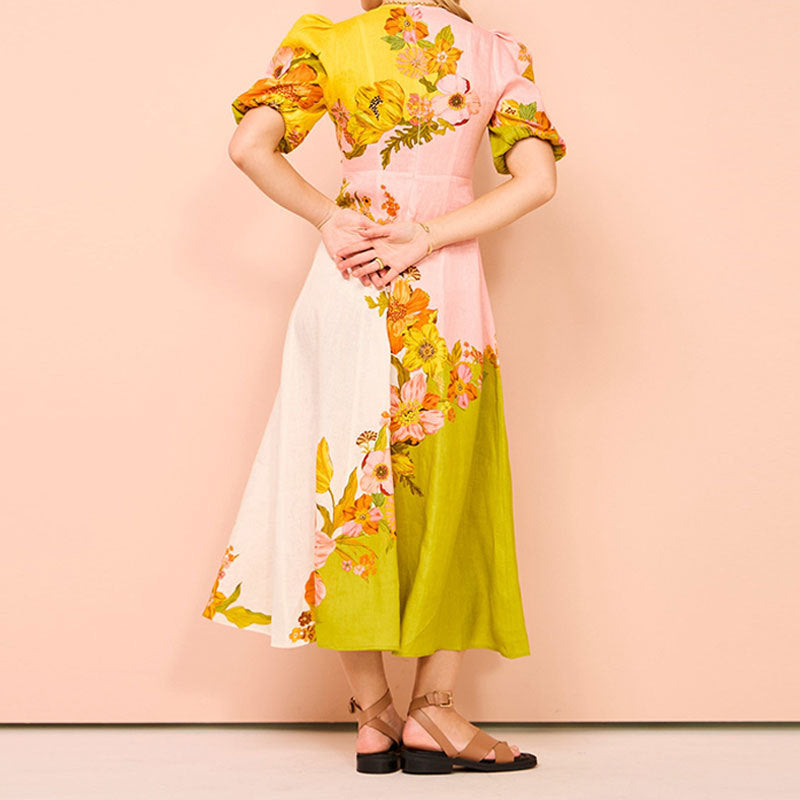 Fridelle - Frau mit Puffärmeln und Blumenprint