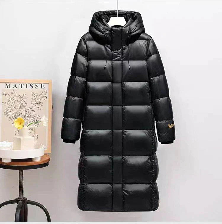 Schwarz Eleganz | Überlange Daunen-Pufferjacke für stilvolle Wärme