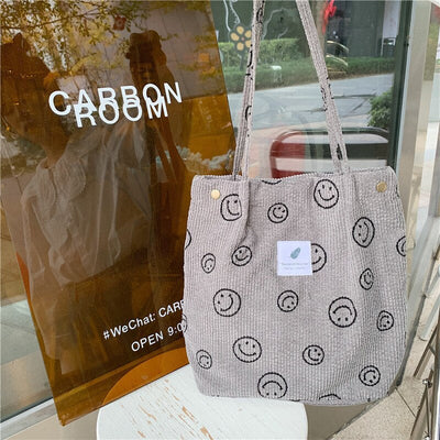 Jimena | Smiley-Tasche aus weichem Kordstoff