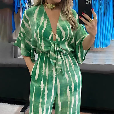 ElegantEssenz | Stilvoller Streifen-Jumpsuit mit Dolman-Ärmeln