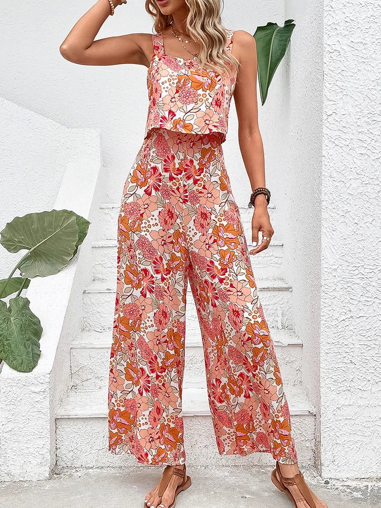 Nigela Floral Jumpsuit | Moderner Sommer-Jumpsuit mit Rückenausschnitt und weiten Beinen