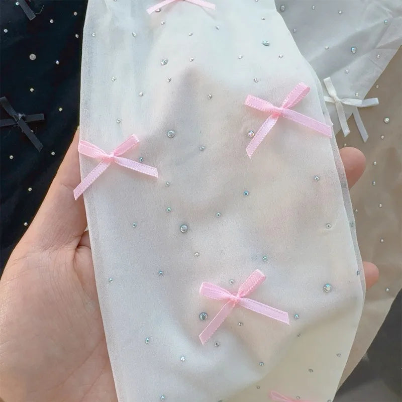 Simone | Verspielte Strumpfhose mit Schleifenmuster