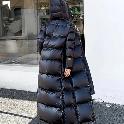 Schwarz Eleganz | Überlange Daunen-Pufferjacke für stilvolle Wärme