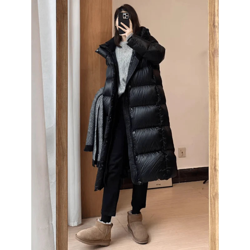 Schwarz Eleganz | Überlange Daunen-Pufferjacke für stilvolle Wärme