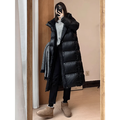 Schwarz Eleganz | Überlange Daunen-Pufferjacke für stilvolle Wärme