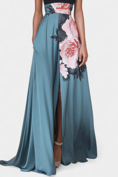 Radmila A-Linienkleid mit schwarzem Oberteil und blumigem Rock in Kontrastfarben