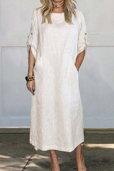 MAXIME ETUIKLEID MIT TASCHEN